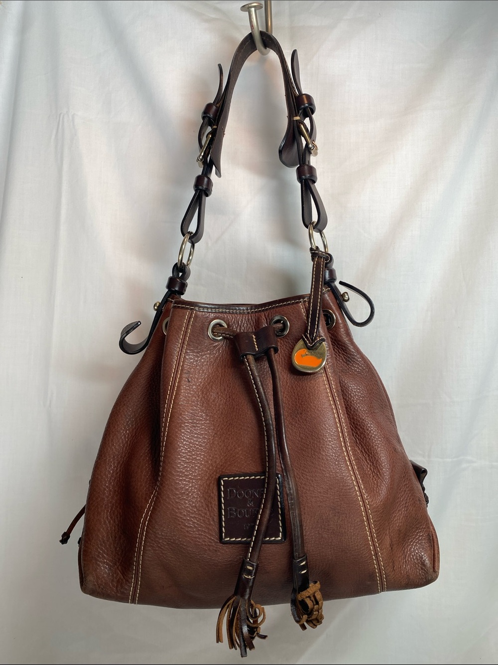 Dooney & Bourke Brown Pebbled Leather Drawstring Bucket Shoulder Bag